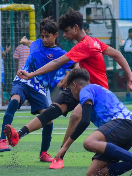 An intense moment from the U15 match against Young Kickers, with players battling for every inch.