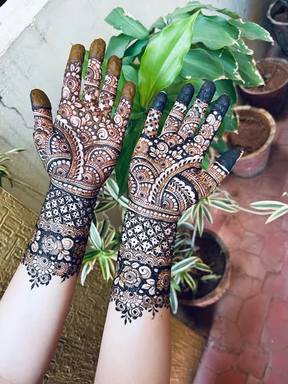 A beautiful engagement design with a mix of traditional Indian and modern elements. The mandala on the back of the hand is a stunning centerpiece.