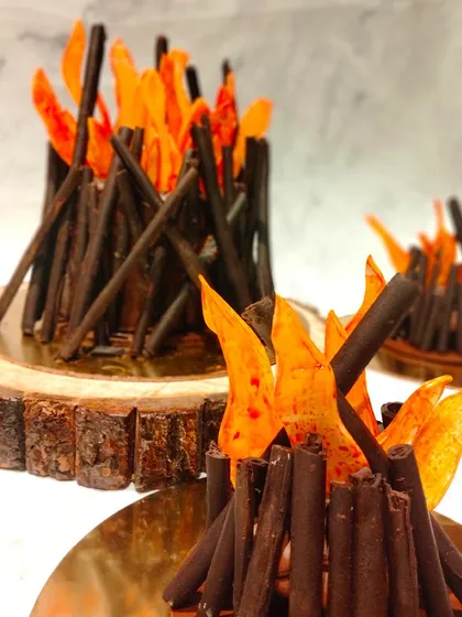 Our Lohri-themed mini cakes, designed to look like festive bonfires. These are made with chocolate and edible flames, capturing the warm spirit of the celebration.