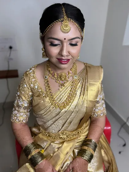 The complete look, showing how the makeup, hair, and jewellery create a harmonious and regal bridal appearance.