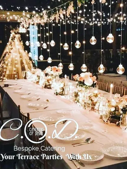 We transform any space into a magical setting, like this enchanting terrace party setup. With elegant sit-down dining under a canopy of fairy lights and hanging bulbs, we create the perfect ambiance for an unforgettable evening.
