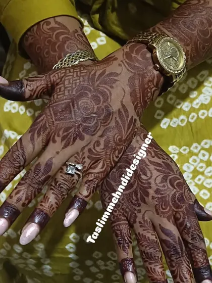 The rich, dark stain of this floral mehndi shows the quality of the natural henna I use. The design is a mix of bold flowers and delicate patterns, shown here after the paste has been removed.