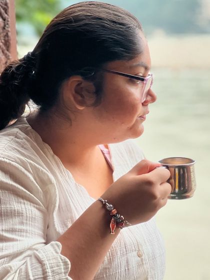 Sipping on warm herbal tea, a simple pleasure that becomes a mindful ritual during the retreat. It is in these small moments that we find great peace.