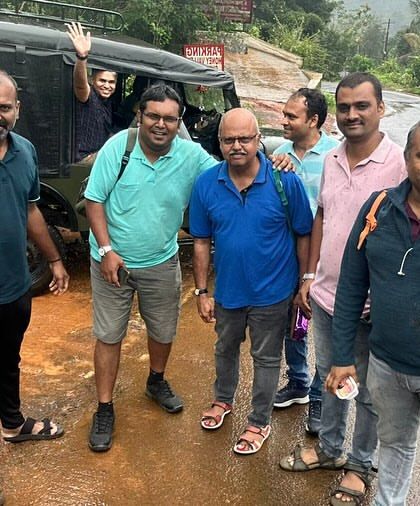 A happy group photo with our jeep, the trusty vehicle that takes us through the tough terrains of Coorg.