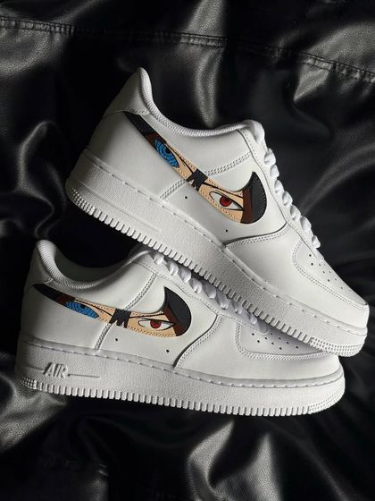 A top-down view of the Sasuke-themed custom Nike Air Force 1s.