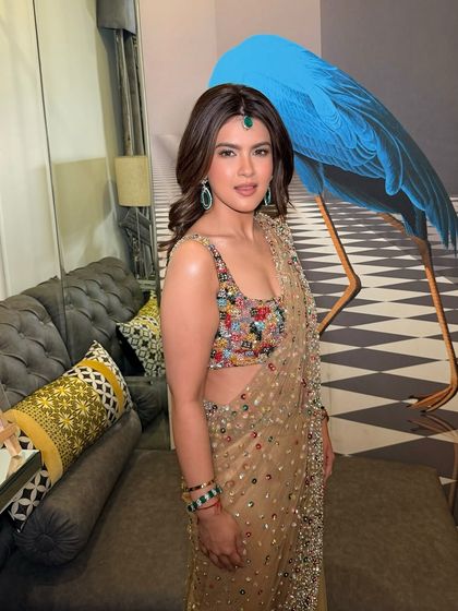 Another angle of this firecracker Diwali glam. The makeup is designed to be festive and fun, perfect for a night of celebration.