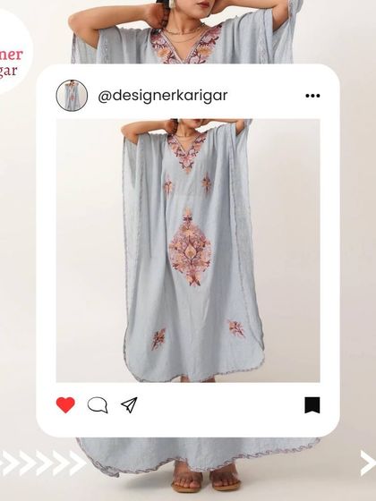 A lovely light blue kaftan with delicate floral embroidery on the chest and sleeves. This is a great option for a relaxed, chic style.