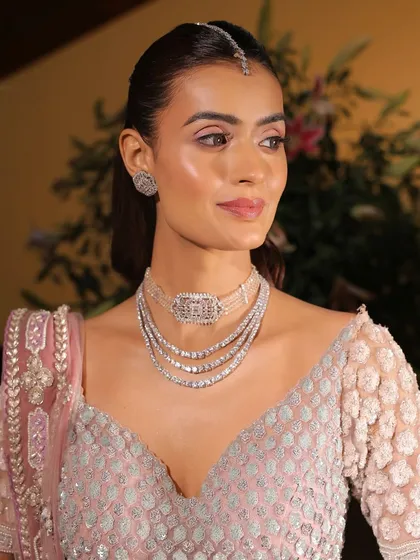 The side profile highlights the clean lines of the makeup and the glowing skin. This is a perfect example of how minimal makeup can have a major impact.