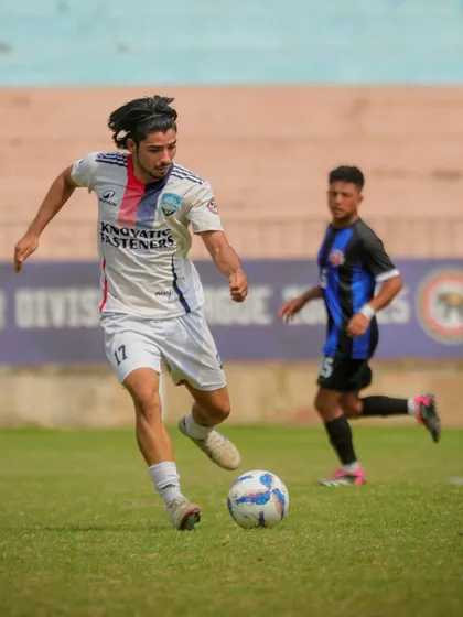 An action shot from Gameday 6, with our player controlling the ball in midfield.