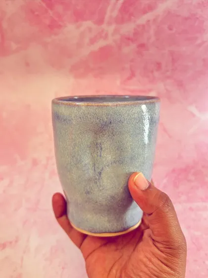 A different angle of the light purple grip mug, showing its simple, elegant form.