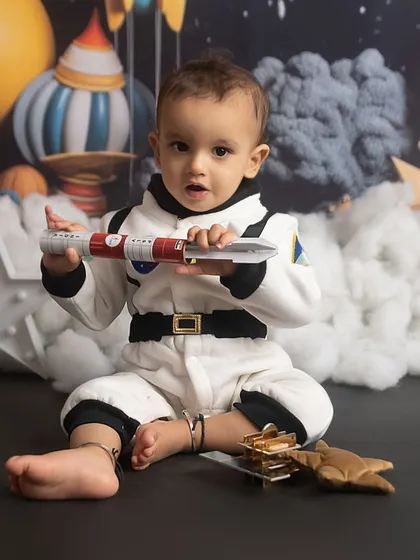 Our little astronaut exploring his rocket ship. Themed sessions are all about letting kids play and imagine.