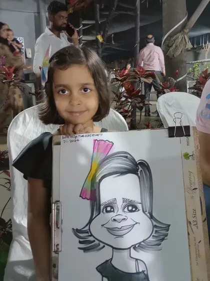 This young girl was delighted with her caricature. It's a fun and unique activity for any kids' party.