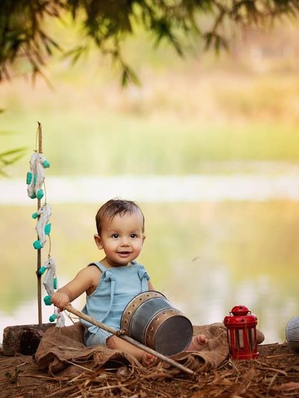 Gone fishing! This outdoor toddler shoot by the water has such a fun and adventurous theme. The natural light and beautiful location make for a perfect backdrop to capture his happy expression.