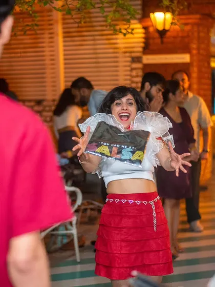 That feeling when the music hits and you can't help but express your joy. A candid shot of one of our students having the time of her life at La Rumba.