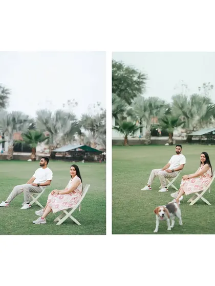 A relaxed moment with the couple and their dog sitting on chairs in a park, enjoying a quiet moment together.