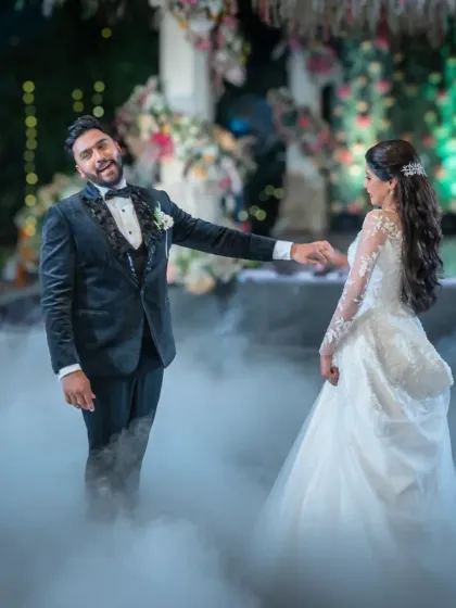 The first dance is always a magical moment. Here, the groom is having a blast, and his energy is just contagious. I love capturing the fun and joy of the wedding reception.