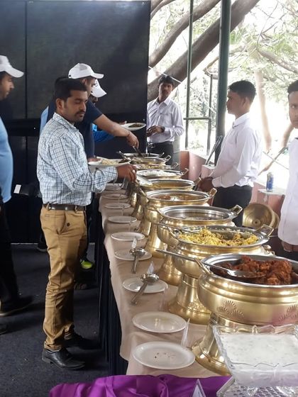 Catering for a corporate cricket tournament. We can set up our services at any location, including sports fields and outdoor venues, for your company's events.