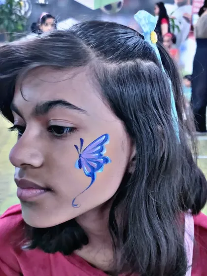 A delicate blue butterfly design, simple, elegant, and always a popular choice.