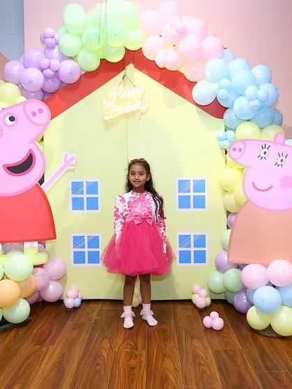 We bring beloved characters to life with our detailed theme setups. This Peppa Pig party features a custom backdrop of Peppa's house, character cutouts, and a perfectly coordinated pastel balloon arch for a truly oink-tastic day.