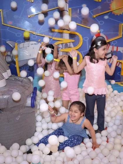 It's a blizzard of fun in our giant ball pit. This area is perfect for kids to dive, play, and laugh together in a sea of soft, colorful balls.