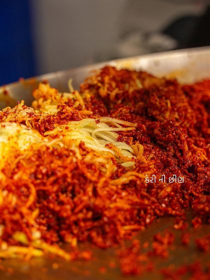 This is the 'keri no chundo', or grated raw mango, that we mix with the stuffed gunda berries. It adds an extra layer of tanginess and texture to the pickle.