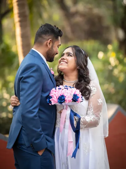 Real stories, real love. This happy, natural portrait of the couple captures the genuine joy of their wedding day without any stiff posing.