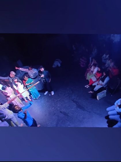 A powerful final tableau from a student production, with the entire cast on stage, creating a memorable image for the audience.