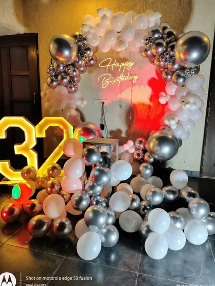 The 32nd birthday decoration with red lighting, demonstrating the versatility of the setup.