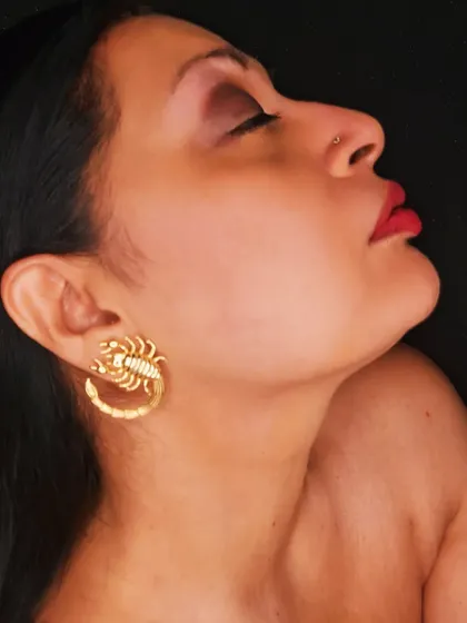 Earrings that make a statement. These unique scorpion-shaped earrings are a bold and edgy choice, perfect for adding a conversation-starting element to your look.