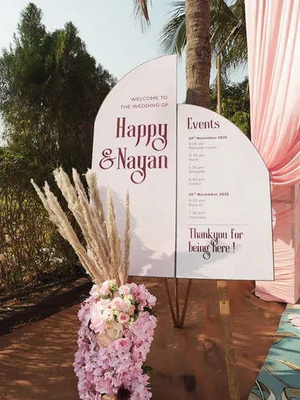 A welcome sign should be both beautiful and helpful. For this wedding, I designed a modern, two-panel sign that not only welcomed guests but also clearly displayed the event schedule, making sure no one missed a moment.