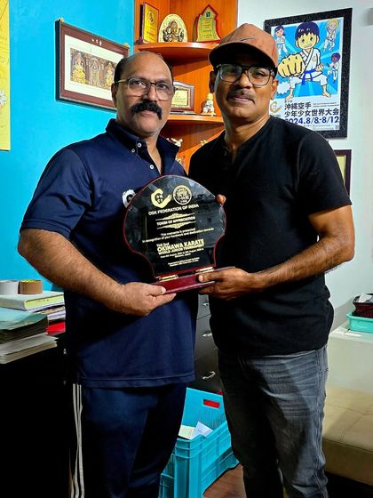 With Mr. Ranjit, the Managing Director of Travelxpo, our official travel partner. His support was crucial in managing our team's travel to the World Junior Tournament in Japan.