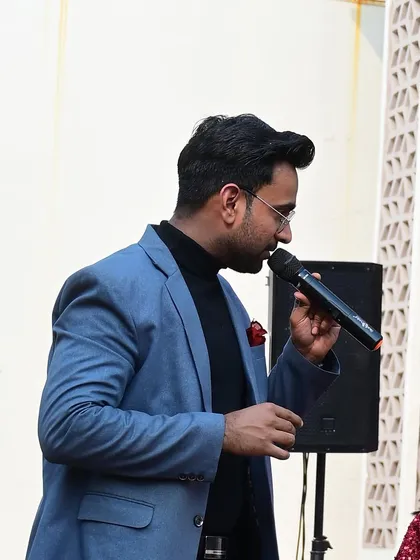 Addressing the audience from the stage. Connecting with the crowd is essential, even in a large venue.