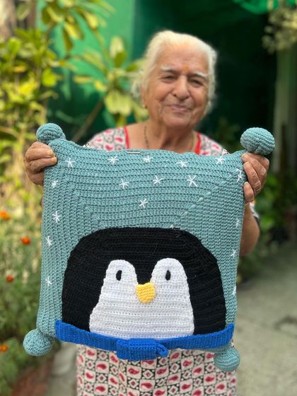 A sweet penguin cushion in a lovely shade of teal. The embroidered stars add a little extra magic to this winter-themed design.