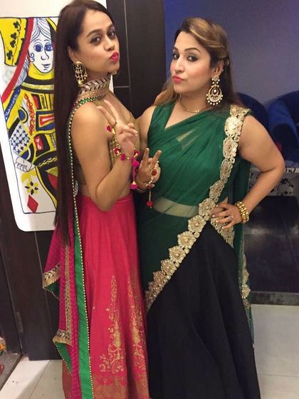 Getting into the festive spirit for a Diwali party. I love helping clients coordinate looks, like these stunning ethnic ensembles in pink and green, that feel celebratory and fun.