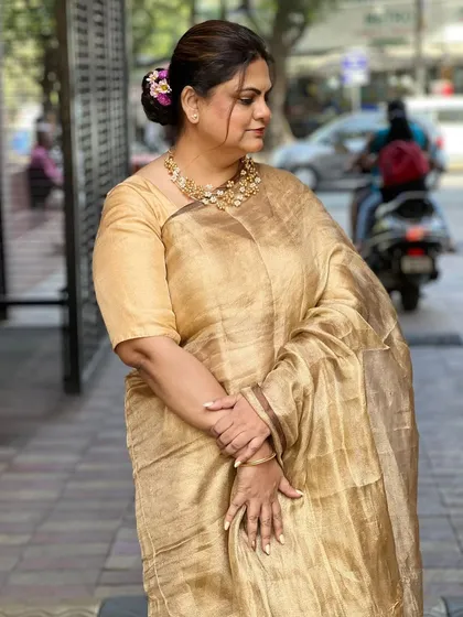 Another angle of the client's elegant look, perfect for any formal event.