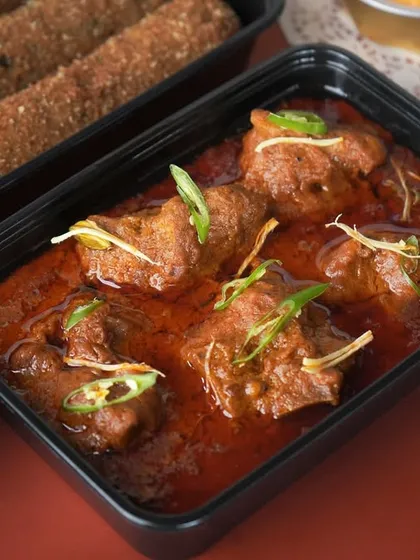 My signature Mutton Nihari, slow-cooked to perfection, garnished with fresh ginger and green chilies, and packed for a bulk delivery.
