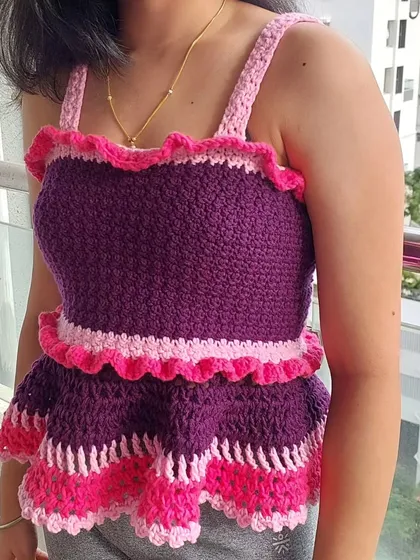 A closer look at the textured stitches and ruffled details of the Azores Top.