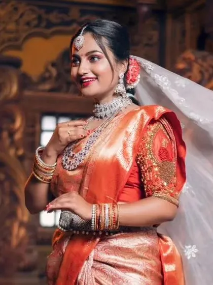 Another beautiful shot with a flowing veil, highlighting the brilliance of the American diamond jewellery.