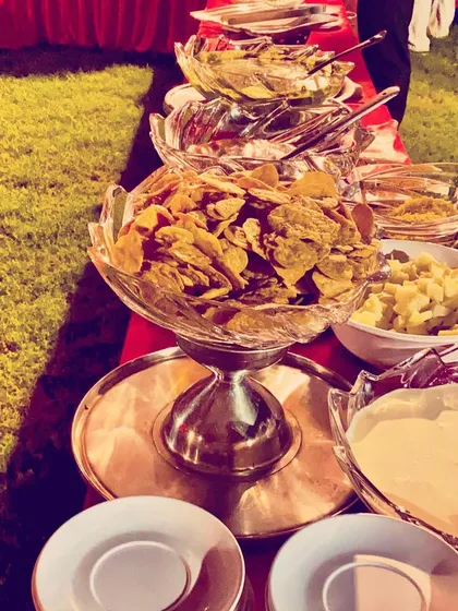 A simple yet popular starter option. This station offers crispy nachos with a variety of fresh dips, a perfect snack for guests to mingle and enjoy at any social gathering.