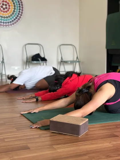 The practice of Balasana, or Child's Pose, is a moment of rest and introspection. It gently stretches the hips and back while encouraging mindful breathing.