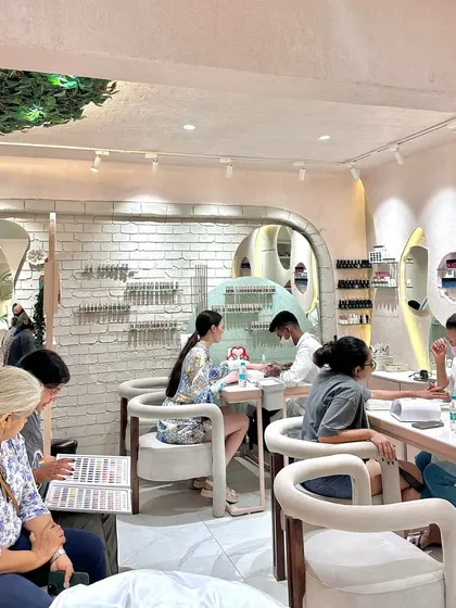 Clients enjoying a day of pampering. Our layout is designed for comfort, whether you're here for a quick blowdry or a full day of services.
