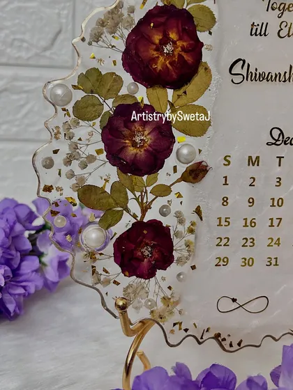 The engagement plaque displayed on a golden easel. It's a beautiful way to commemorate a special day.