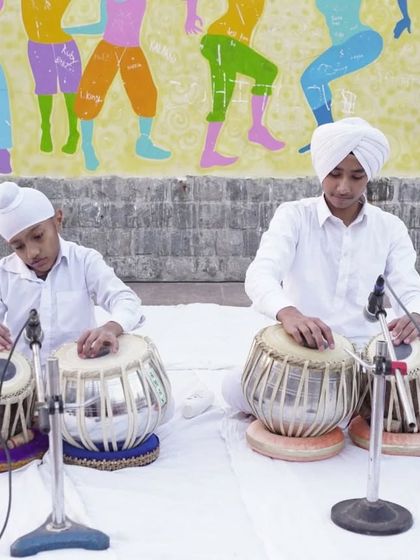 Two of our students performing together, showcasing the collaborative spirit we foster at the academy.