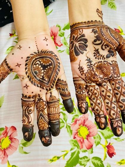 A heart-shaped design that is both modern and romantic. One hand features a bold heart motif, while the other has a complementary pattern of checks and florals.