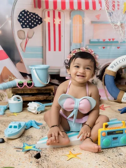 A happy, smiling beach baby. These sessions are designed to be bright, cheerful, and fun.