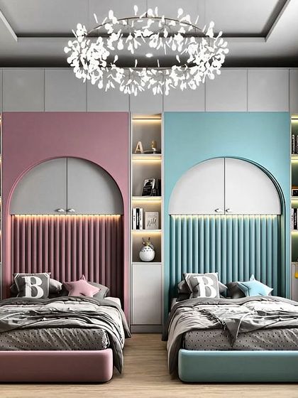 A shared bedroom concept for two, with distinct pink and blue themes for each bed. The arched headboards with fluted paneling and built-in bookshelves create personalized and stylish nooks.