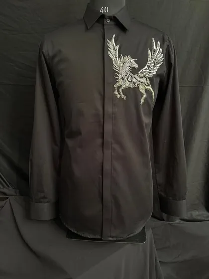 This black shirt features a powerful winged horse (Pegasus) embroidered in silver and grey thread on the chest, adding a touch of myth and legend to a classic silhouette.