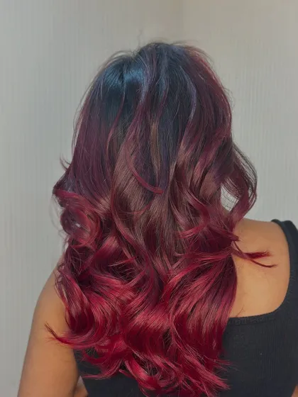 The side view shows how the red tones are blended into the dark base for a seamless transition.