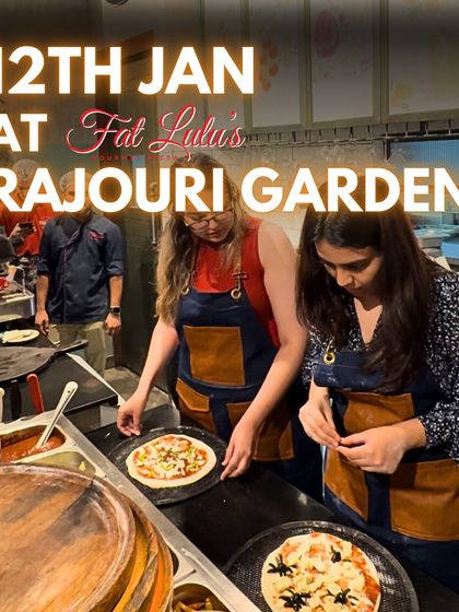 This is where the creativity kicks in. Participants at the counter carefully adding their favorite toppings to their hand-stretched pizza bases.