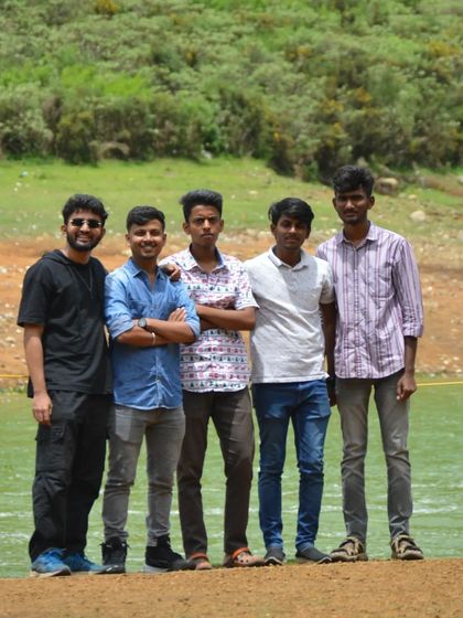 The group posing by the water. We make sure to get plenty of group photos to remember the trip by.